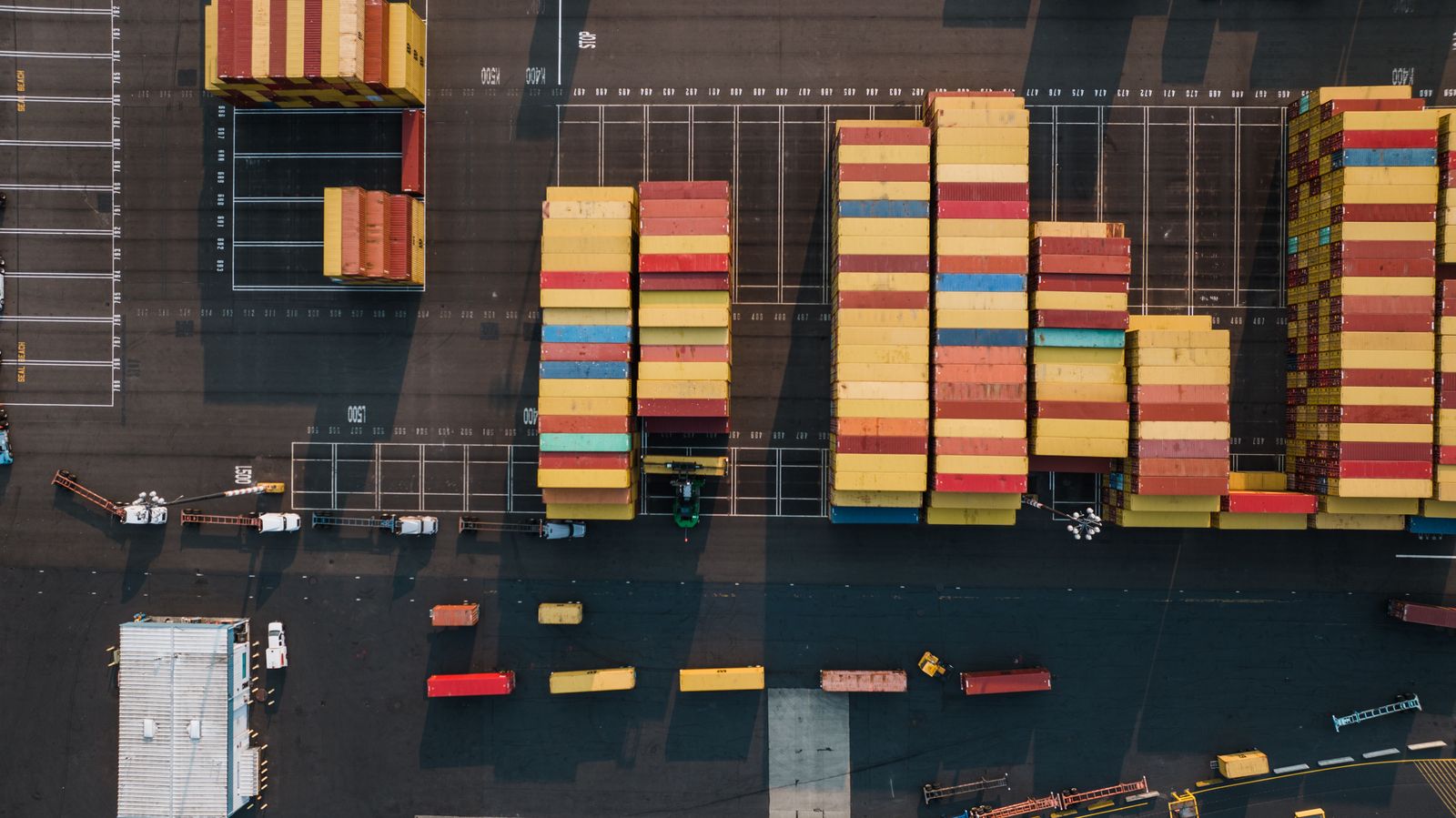 Cargo containers moving through a North American port