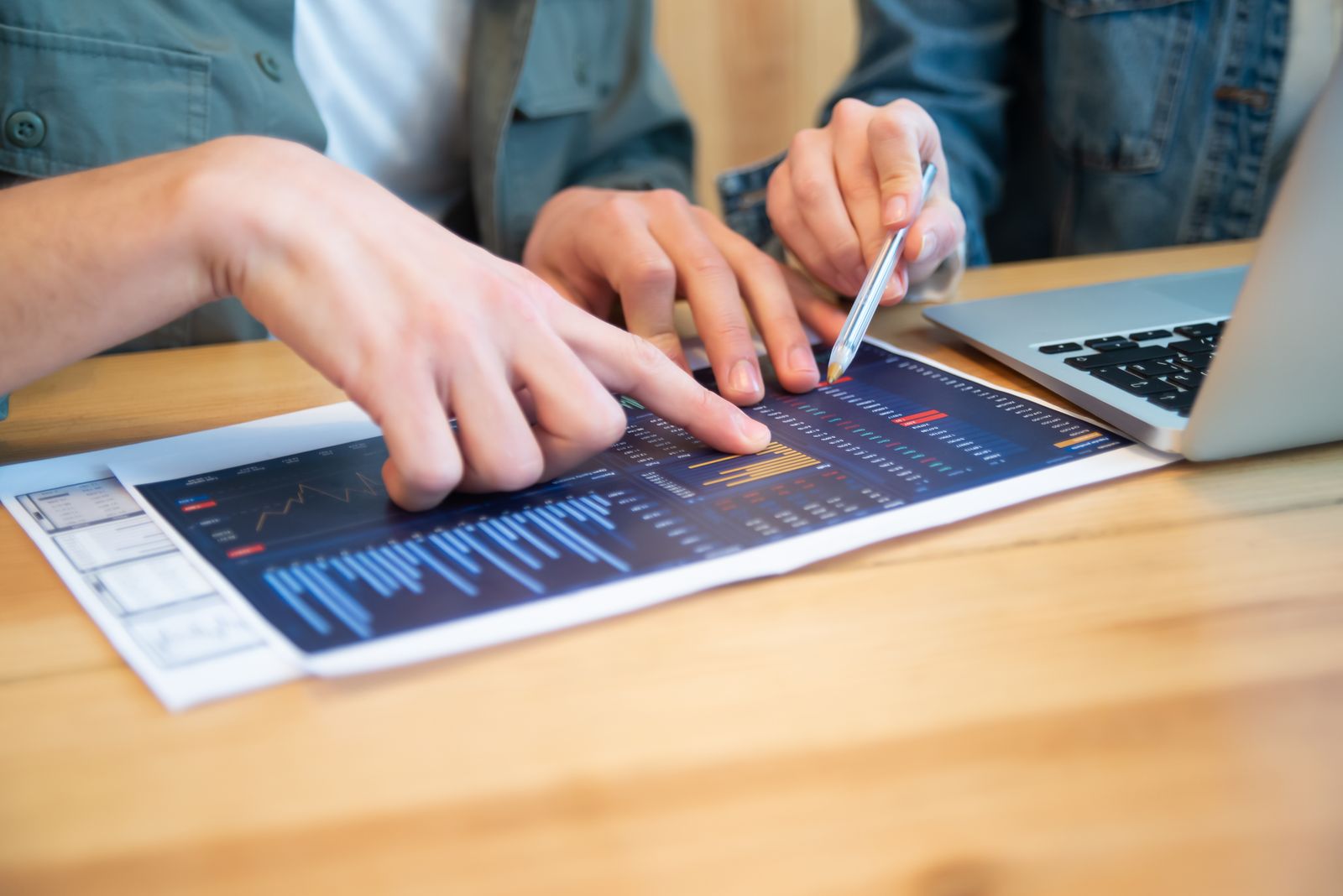 Business users reviewing performance data together